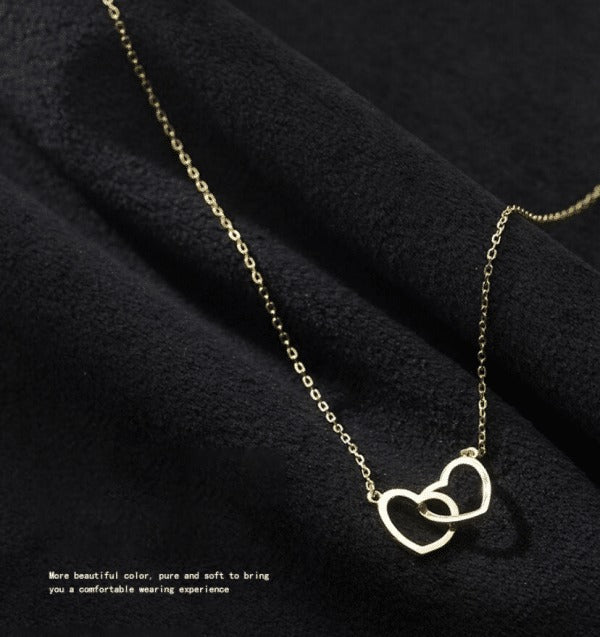 Geometric double-loop interlocking necklace
