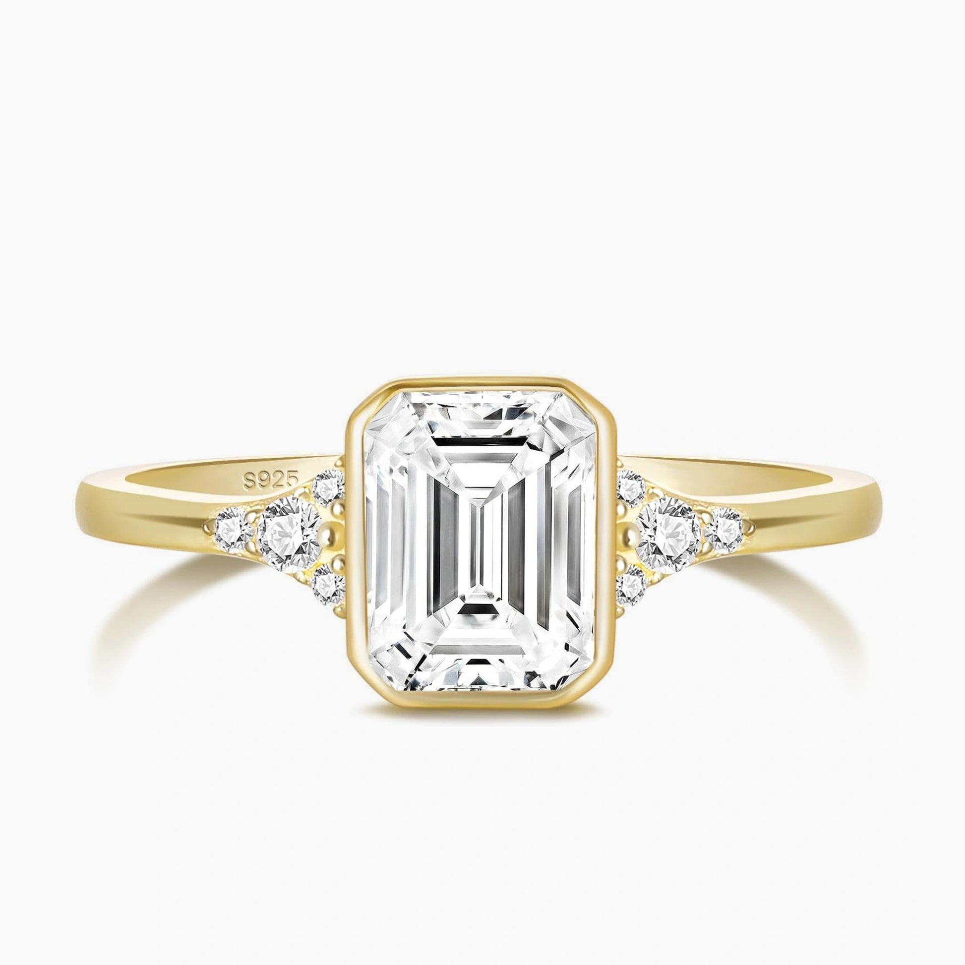 bezel engagement rings, emerald cut engagement rings, emerald cut, emerald diamond, emerald cut diamond ring, emerald cut ring, emerald diamond ring, fake diamond rings, cubic zirconia engagement rings, cubic zirconia wedding rings, silver engagement rings, cz stones, travel rings