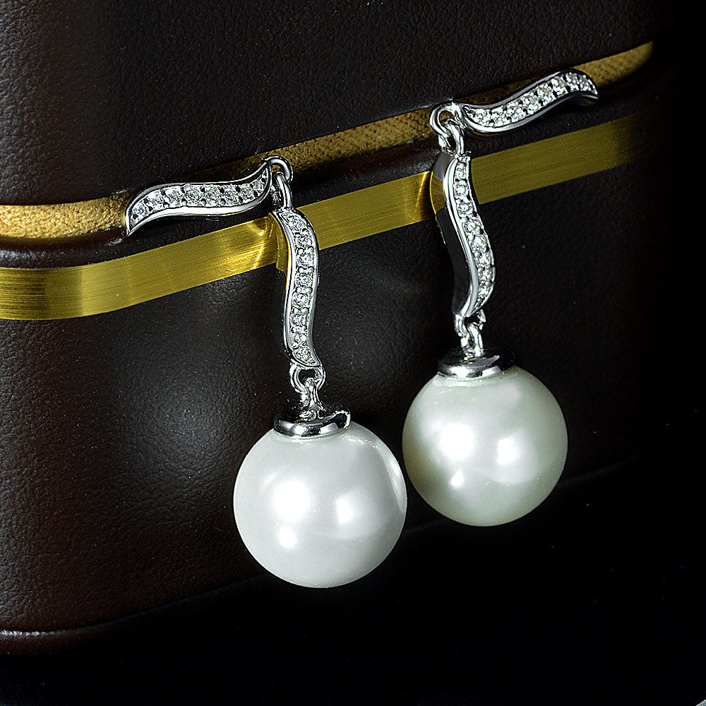 Sterling Silver Ripple Dangle Pearl Earrings