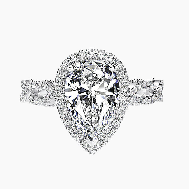 stunning wedding rings; vintage engagement rings; Eamti; teardrop ring; teardrop engagement ring; teardrop emerald ring ; teardrop wedding ring;
