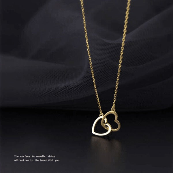 Geometric double-loop interlocking necklace