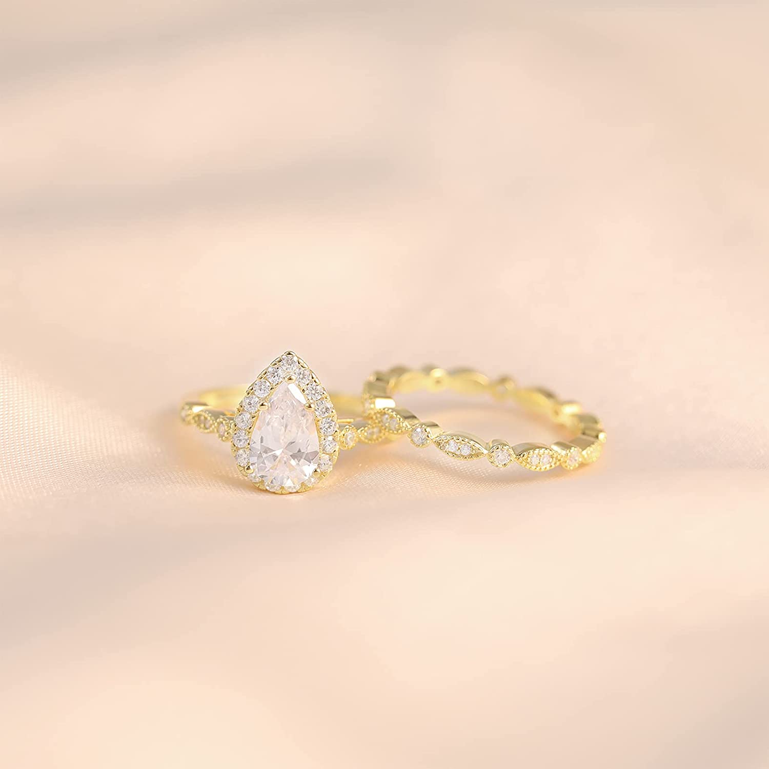 pear shaped teardrop rings; vintage engagement rings; Eamti;